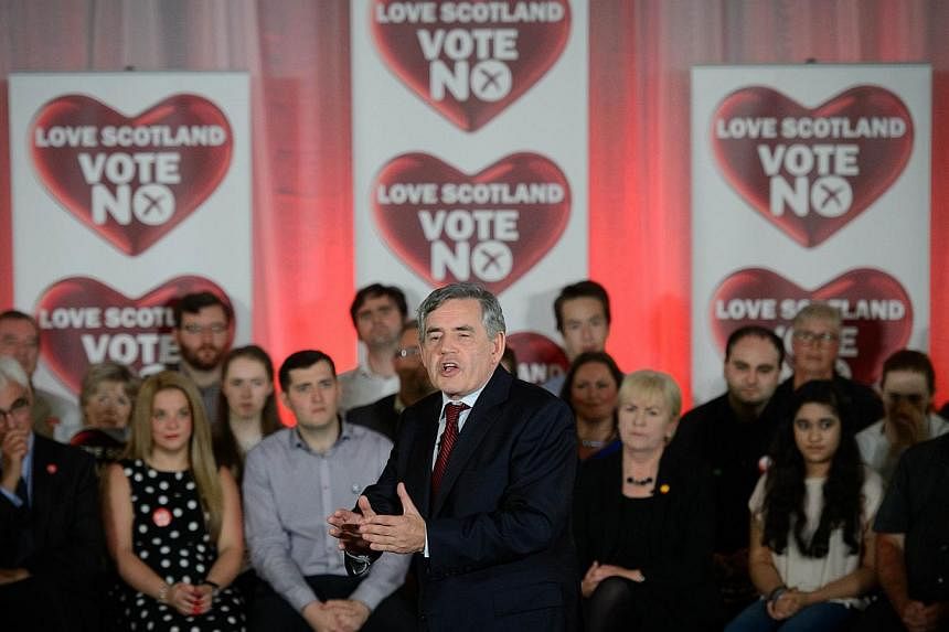 Former British Prime Minister Gordon Brown addresses a rally in Glasgow, Scotland on Sept 17, 2014, ahead of the referendum on Scotland's independence. -- PHOTO: AFP