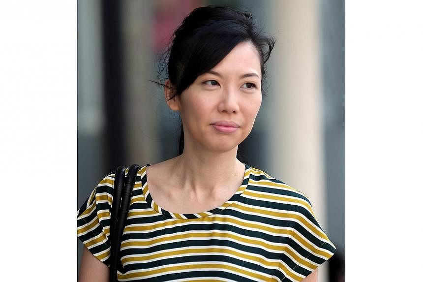 More than two years after she was charged in 2012, City Harvest Church (CHC) finance manager Sharon Tan said on Friday she still does not know why. -- ST PHOTO:&nbsp;WONG KWAI CHOW