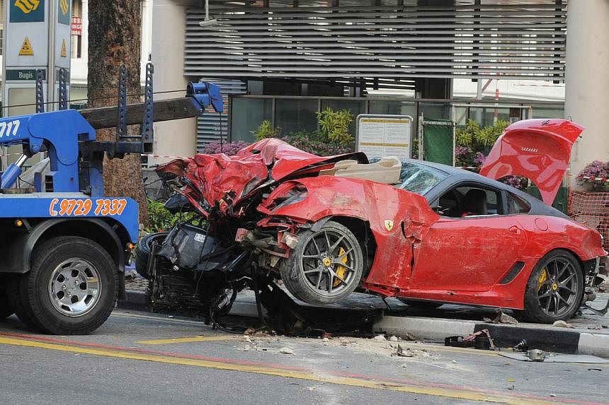 The Ferrari being towed from the scene of the accident, which took place at the junction of Rochor Road and Victoria Street in May 2012. Mr Ma Chi, driver of the sports car, cabby Mr Cheng Teck Hock and his Japanese passenger Shigemi Ito died in the 