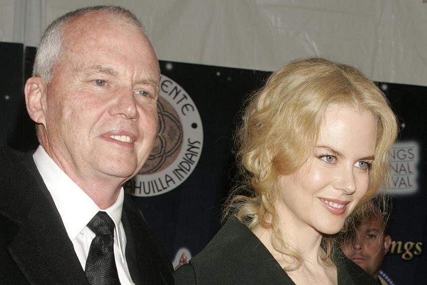 Actress Nicole Kidman is escorted by her father, Dr Antony Kidman, as she arrives at the 2005 Palm Springs Film Festival Gala dinner in Palm Springs, California in this January 8, 2005 file photo. The actress said a final farewell to her father at hi