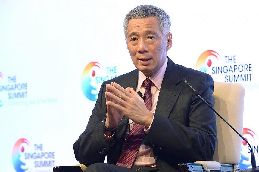 Singapore Prime Minister Lee Hsien Loong speaks during the Singapore Summit at the Singapore ShangriLa Hotel in Singapore on Sept 20, 2014. &nbsp;-- ST PHOTO:&nbsp;NG SOR LUAN