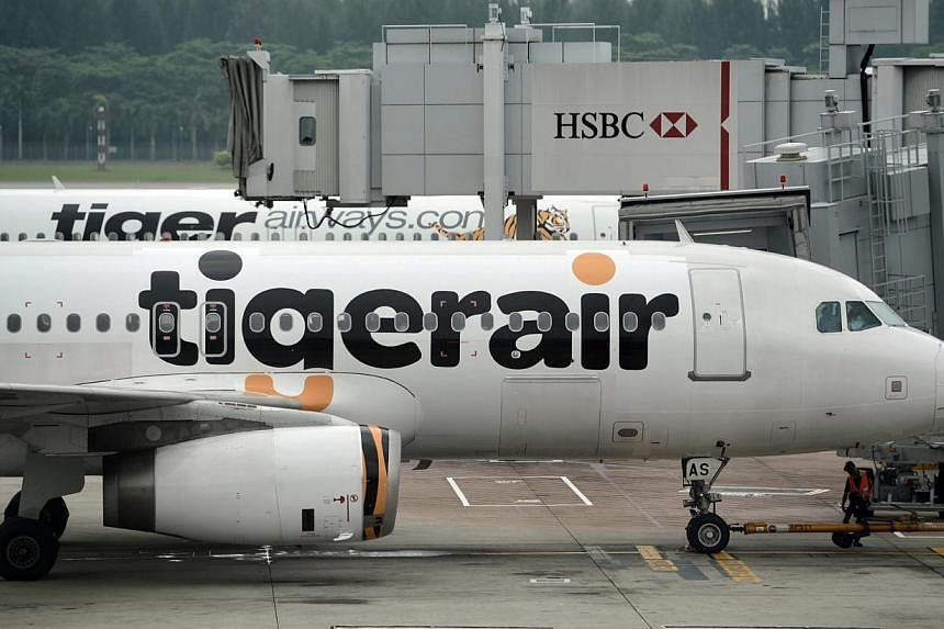 Australian police removed a man from a Tiger Airways flight on Saturday allegedly over his terrorism-related doodling on the plane.&nbsp;-- PHOTO: ST FILE