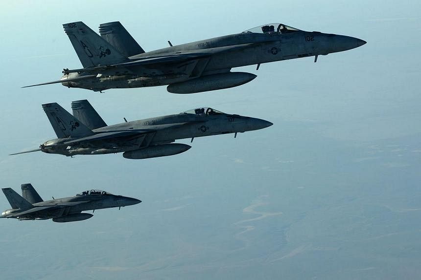 US war planes flying over northern Iraq on Sept 23, 2014. -- PHOTO: AFP