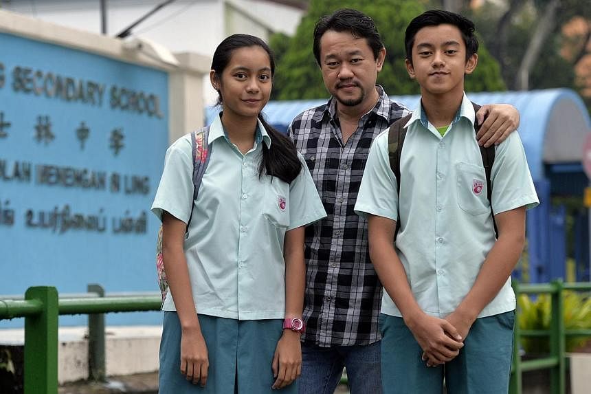 Singaporean Fahmi Rais, who lives in Johor Baru, drives across the Causeway to drop off three of his children at schools here - Siti Nur Natasya and Mikhael Rais at a secondary school and another daughter at the Institute of Technical Education. With