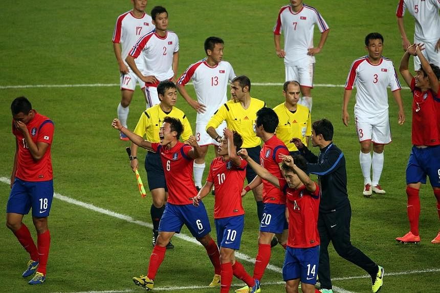 South Korea beats North Korea 1-0 in extra time to win the gold medal in the 17th Asian Games Incheon 2014 football men's final held at the Munhak Stadium, in Incheon, South Korea, on Oct 2, 2014.&nbsp;-- ST PHOTO: NEO XIAOBIN