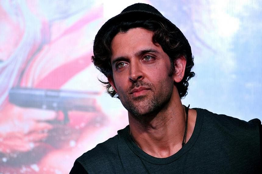 Indian Bollywood actor Hrithik Roshan looks on during a promotional event for the forthcoming Hindi film 'Bang Bang' in Mumbai on Sept 22, 2014. -- PHOTO: AFP&nbsp;