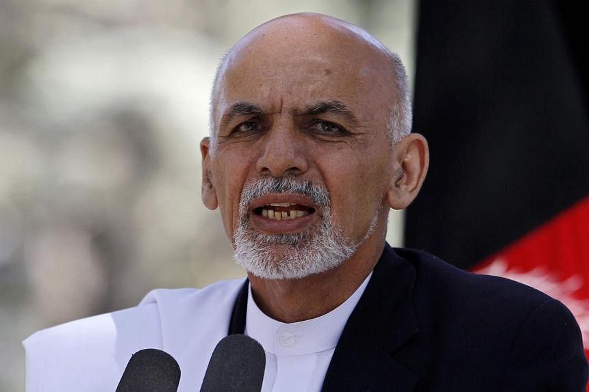 Newly-inaugurated Afghan President Ashraf Ghani on Friday, Oct 3, set a fresh tone in relations with Nato countries that have fought against Taleban insugents, paying a fulsome tribute to foreign soldiers who died in battle. -- PHOTO: REUTERS