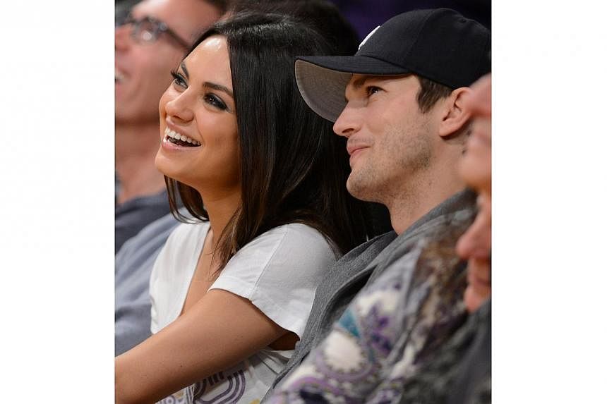 Ashton Kutcher, the star of the hit television show Two and a Half Men and his partner, actress Mila Kunis, have named their baby daughter Wyatt Isabelle, the actor said. -- PHOTO: AFP