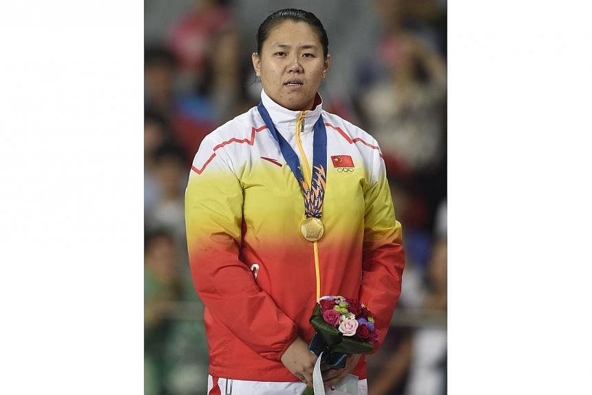 Women's hammer gold medallist Zhang Wenxiu of China has failed a doping test at the Asian Games and has been thrown out of the competition, the Olympic Council of Asia (OCA) announced on Friday. -- PHOTO: AFP
