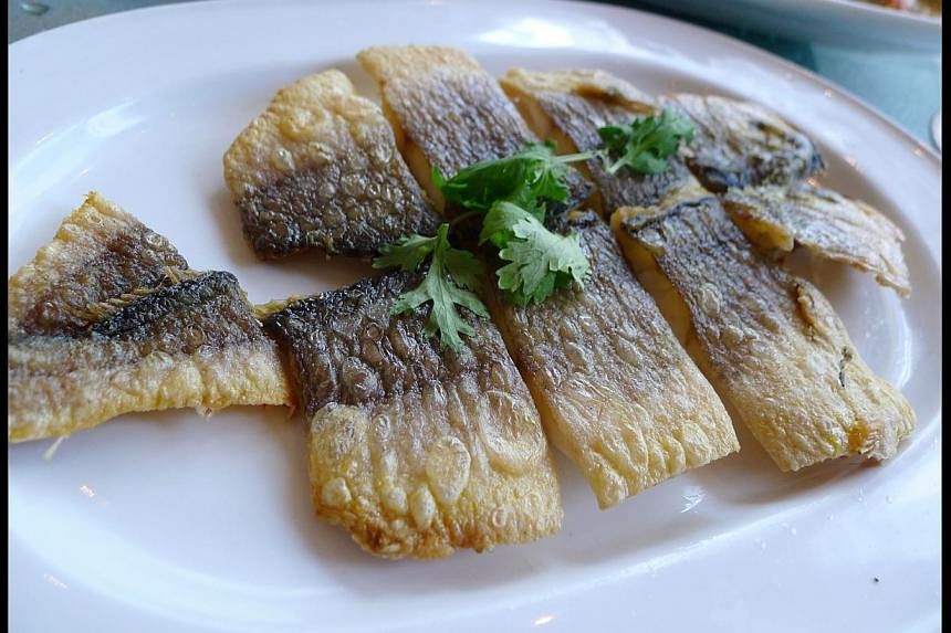 Pan fried yellow croaker fish from Chui Huay Lim Teochew Cuisine. -- ST PHOTO: WONG AH YOKE
