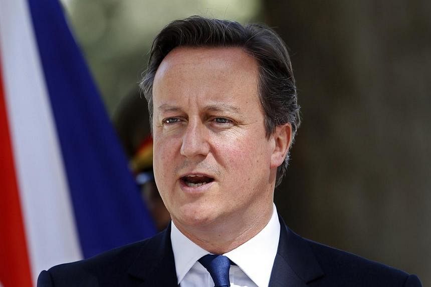British Prime Minister David Cameron said on Saturday he would use "all the assets we have"to try to find hostages being held by Islamic State in Iraq and Syria (ISIS). -- PHOTO: REUTERS
