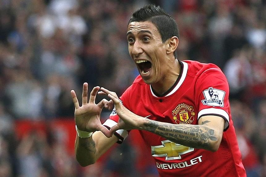 Manchester United's record signing Angel di Maria has revealed that he is relishing the physicality of the Premier League and believes he is already clicking with his new team-mates. -- PHOTO: REUTERS