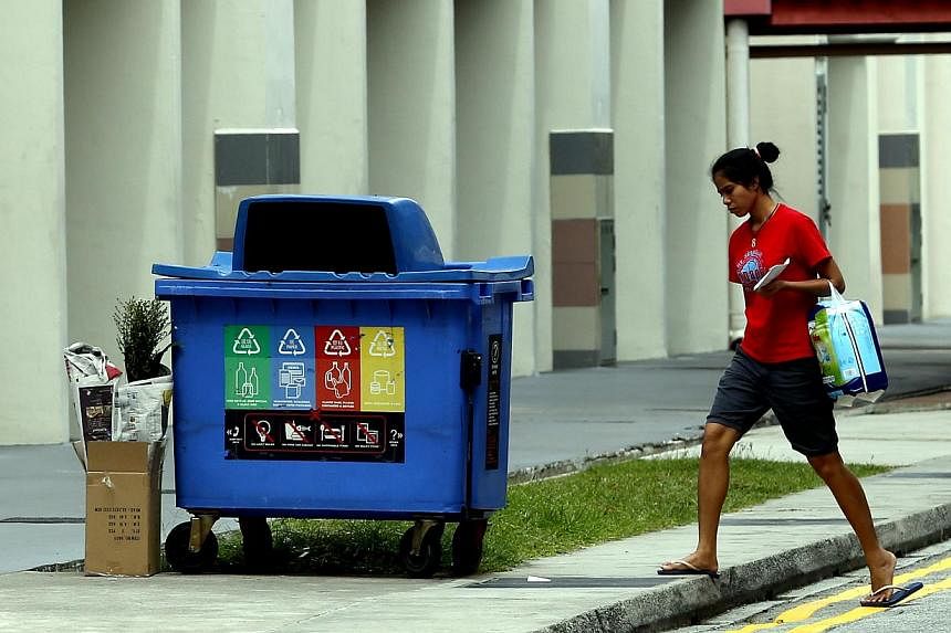 The NEA's move to put a bin at each block is part of a larger initiative to raise Singapore's overall recycling rate to 70 per cent by 2030.