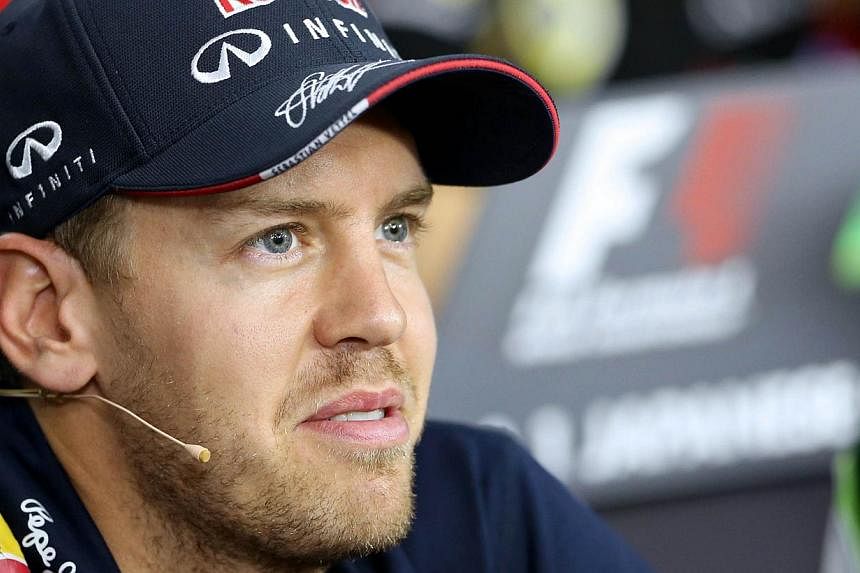 Four-time Formula One world champion Sebastian Vettel is leaving Red Bull at the end of the season and his seat will be taken by Toro Rosso's Daniil Kvyat, the team announced on Saturday. -- PHOTO: AFP