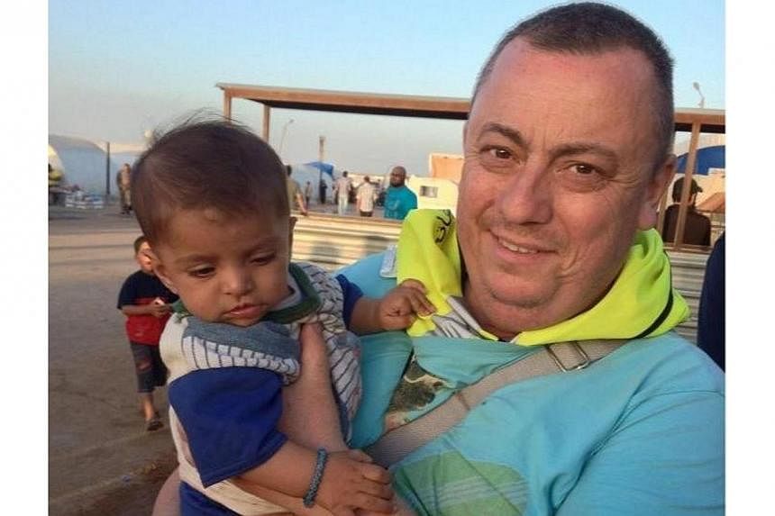 An undated family handout photo of British aid worker Alan Henning taken at a refugee camp on the Turkish-Syria border. Described by his&nbsp;wife Barbara as "a peaceful, selfless man" who left his job as a taxi driver in Manchester, north-west Engla