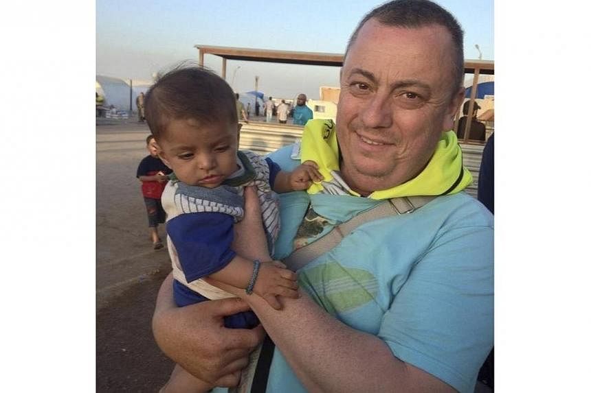 An undated family handout photo of British aid worker Alan Henning taken at a refugee camp on the Turkish-Syria border. -- PHOTO: REUTERS
