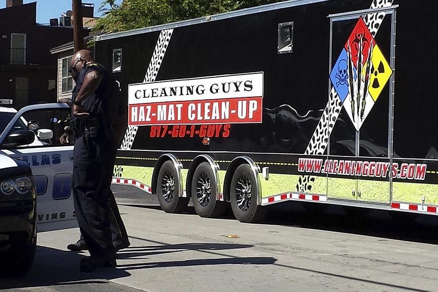 A hazardous materials cleanup trailer enters the apartment complex in Dallas, Texas Oct 3, 2014 where a Liberian man with Ebola stayed. The White House said Friday it has no plans to introduce travel bans to stop Ebola reaching the United States, aft