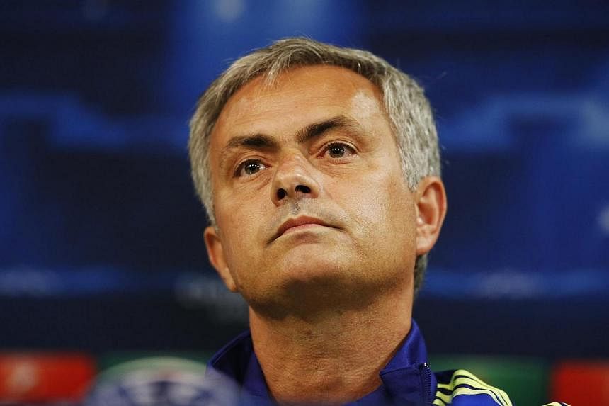 Chelsea manager Jose Mourinho, seen here at a news conference on Sept 29, 2014, claimed on Friday that there is "no racism in football" after being asked to comment on the relative paucity of black managers in the English game. -- PHOTO: REUTERS
