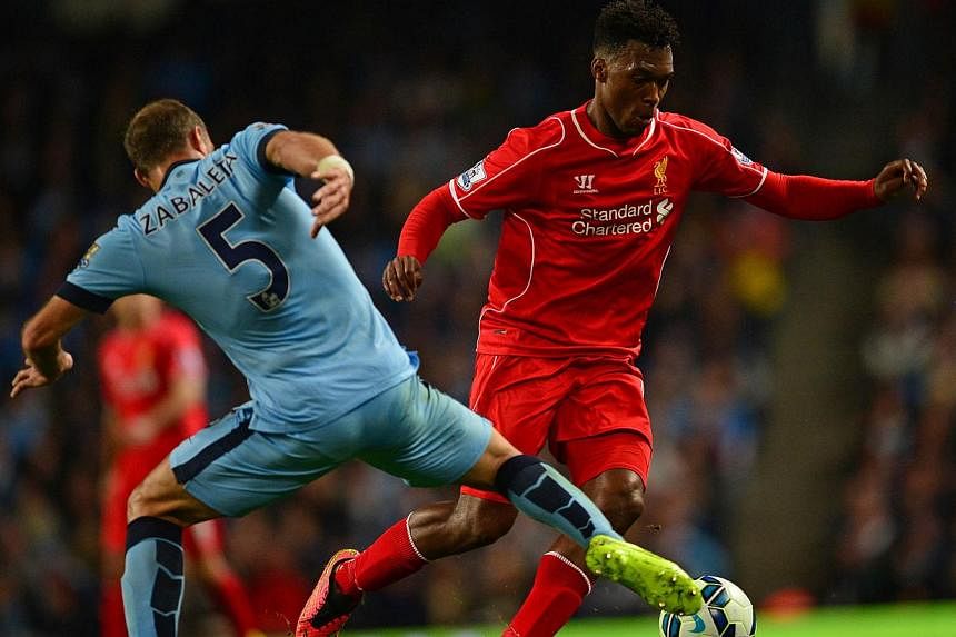 Liverpool's Daniel Sturridge (right) in action with Manchester City defender Pablo Zabaleta (left) during a Premier League match at the Etihad Stadium in Manchester, England, on Aug 25, 2014. AFP. Sturridge has committed his future to Liverpool by si