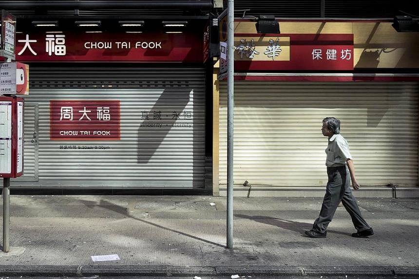 Shuttered stores near a protest site in Hong Kong on Sept 29, 2014. -- PHOTO: REUTERS&nbsp;
