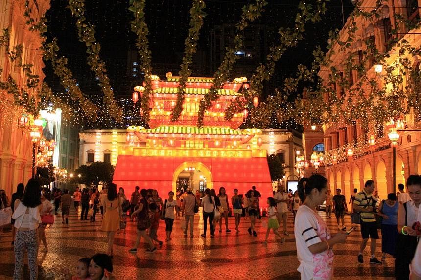 Visit St Dominic’s Church and Senado Square (above) at night for a different experience of the historic centre. -- ST PHOTO: CLARA CHOW