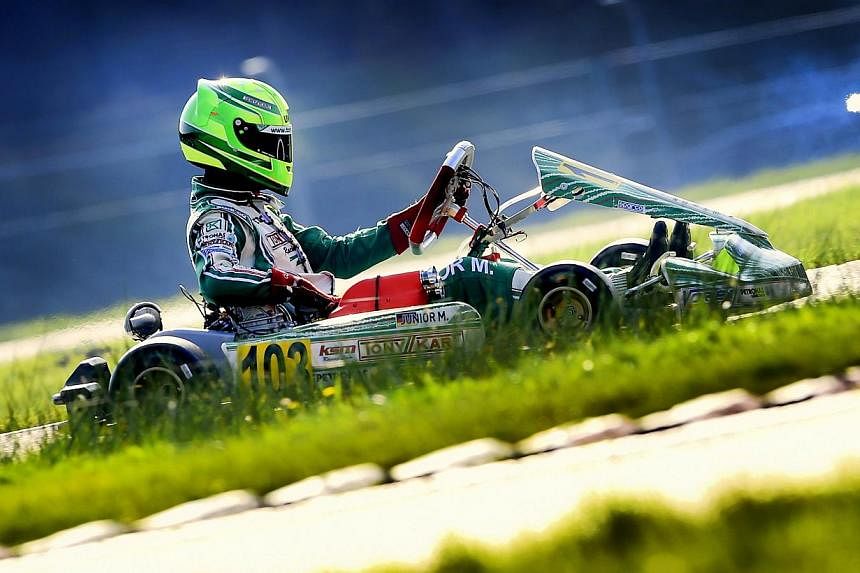 Mick Schumacher, 15 year-old son of former F1 champion Michael Schumacher competes during the German Kart Championship International ADAC, in Genk, on Oct 4, 2014. -- PHOTO: AFP
