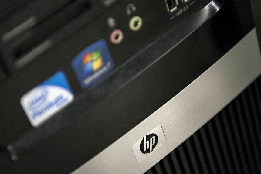 US tech giant Hewlett-Packard said on Monday, Oct 6, 2014, that its corporate reorganisation would slash a total of 55,000 jobs, at least 5,000 more than its latest estimate. -- PHOTO: AFP