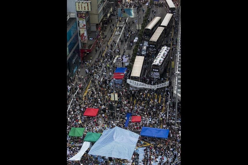 Thousands of protesters blocking the main road in Mong Kok last week. China views the protests as a local incident and Beijing has said it has confidence in the Hong Kong government to handle the situation.