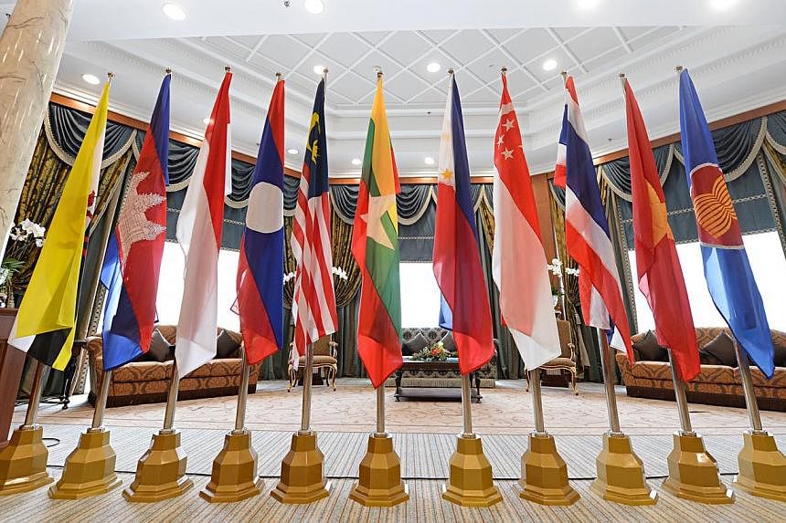 A new survey has found that 80 per cent of firms regard the Asean Economic Community (AEC) as a good business opportunity and believe it will accelerate growth in their industries. -- PHOTO: ST FILE