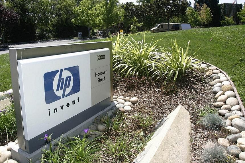 Come October 2015,&nbsp;Hewlett-Packard's (HP's) business&nbsp;will break up &nbsp;into two separate companies, HP Enterprise and HP Inc. -- PHOTO: AFP