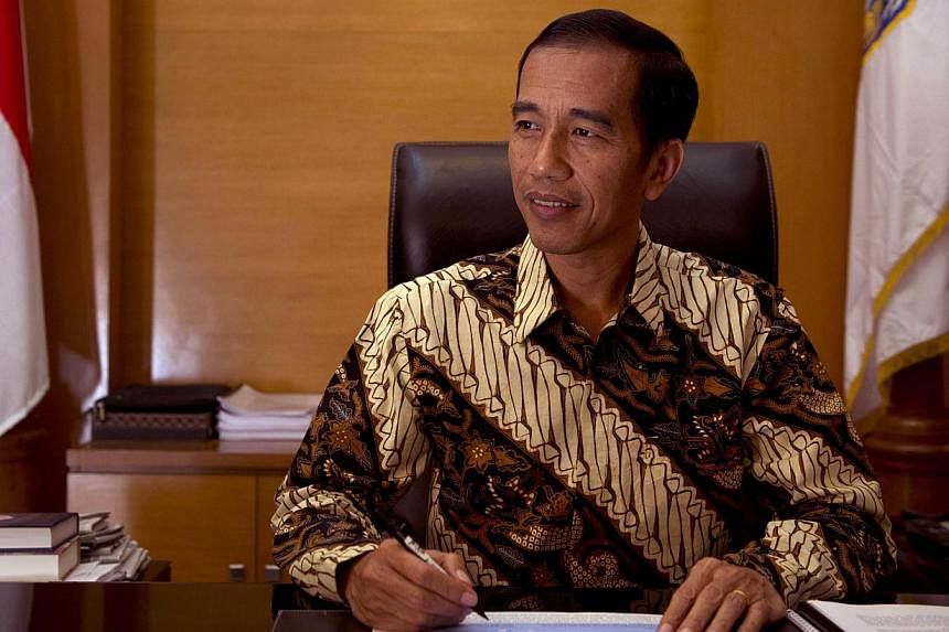 Soon after he became governor of Indonesia's traffic-clogged capital in 2012, Joko Widodo came up with a creative approach to an impasse blocking completion of a ring-road around Jakarta for almost a decade. -- PHOTO: AFP