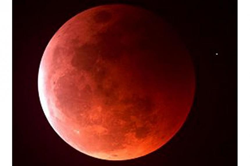 During the total lunar eclipse, which will last several hours, the Earth will pass between the sun and the moon. -- PHOTO: SCIENCE CENTRE