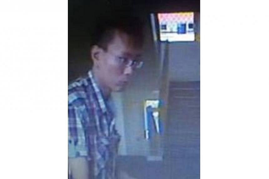 Police are looking for the man pictured here to assist with investigations into a case of loan shark harassment. -- PHOTO: SINGAPORE POLICE FORCE
