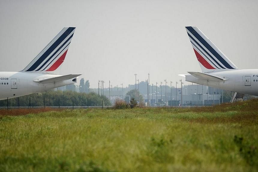 Struggling French flag carrier Air France on Wednesday said last month's two-week strike would have an impact of around 500 million euros (S$808 million) on its bottom line for this year. -- PHOTO: AFP