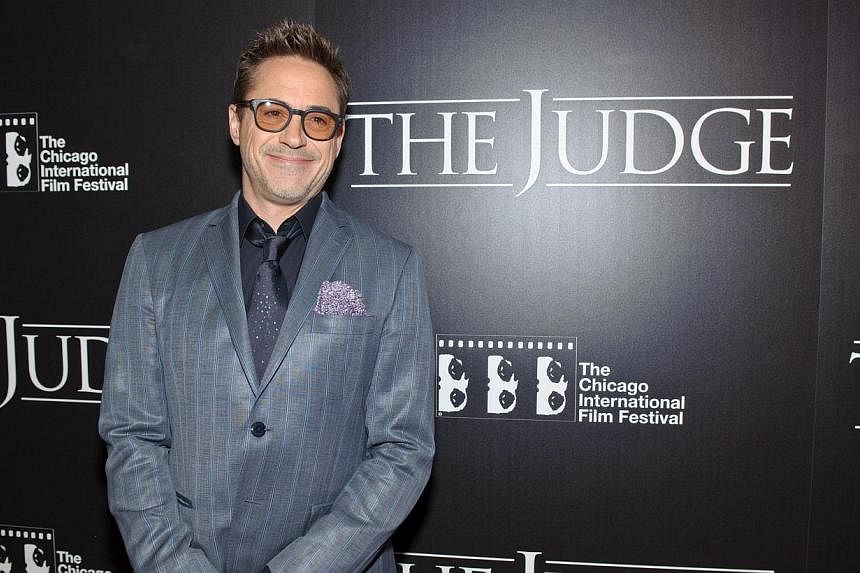 Robert Downey Jr. attends the Chicago premiere of The Judge at AMC River East Theater on Oct 5, 2014 in Chicago, Illinois.&nbsp;The actor is keeping fans guessing whether there is going to be a fourth Iron Man movie, hours after he told Ellen DeGener