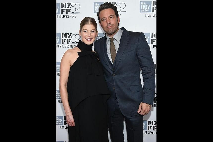 Stars of Gone Girl, Rosamund Pike and Ben Affleck, at the world premiere of the movie in New York last month.