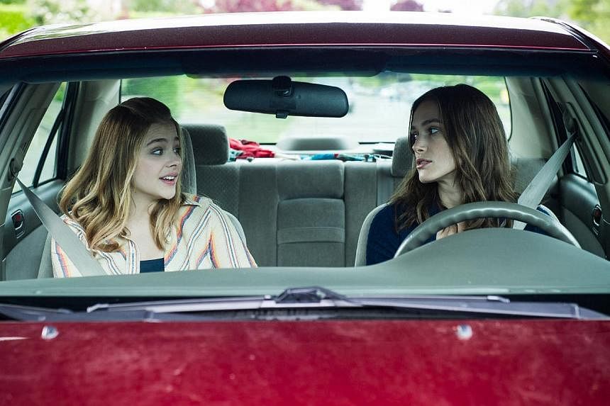 English actress Keira Knightley (right) is perfect as a morose, aimless adult who meets a 16-year-old (Chloe Grace Moretz, left) raised by a single dad in Laggies.