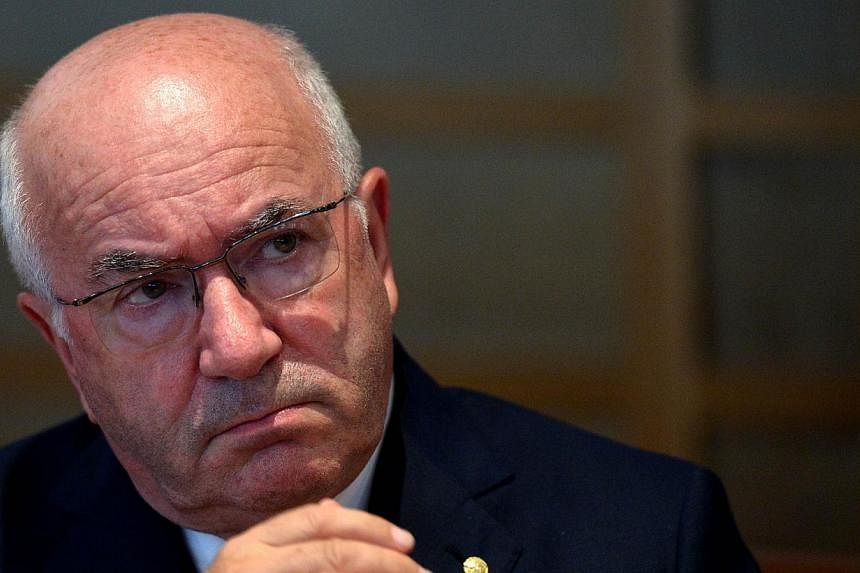 Uefa on Tuesday banned Italian Football Federation boss Carlo Tavecchio for six months and ordered him to hold an anti-racism event in punishment for widely condemned remarks. -- PHOTO: AFP