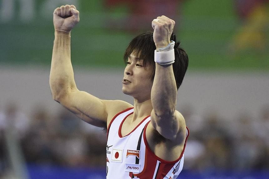 Kohei Uchimura of Japan celebrates in the Men's Team Final during the 2014 World Artistic Gymnastics Championships in Nanning, Oct 7, 2014.&nbsp;Japan's Kohei Uchimura won a record-stretching fifth straight all-around title at the world gymnastics ch