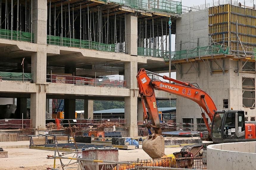 A construction worker was killed and two others were injured when a third-storey platform they were working on collapsed. -- TNP PHOTO:&nbsp;GAVIN FOO