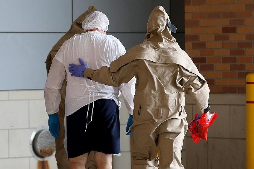 A possible Ebola patient is brought to the Texas Health Presbyterian Hospital &nbsp;in Dallas, Texas, on on Oct 8, 2014. -- PHOTO: AFP