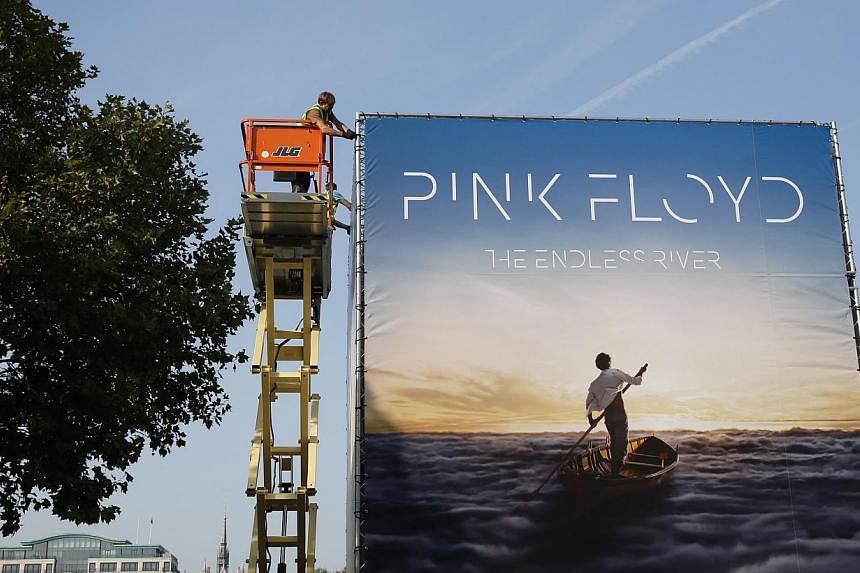 An advertisement for the new Pink Floyd album The Endless River is installed on a billboard on the South Bank in London on Sept 22, 2014. The band's first album in 20 years will be the rock legends' last and will end on a "lyrical" note about the ban
