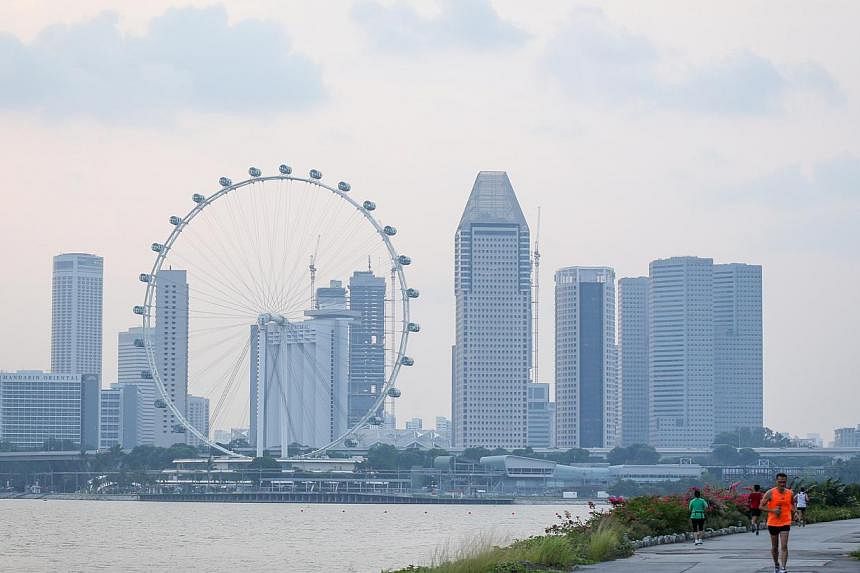 Hazy skies at the Skyline Promenade, Gardens by the Bay (Bay East), on Oct 17, 2014. Some 1,000 sensors will be rolled out throughout Singapore to track everything from air quality and water level to public safety as the Government' "smart nation" pl