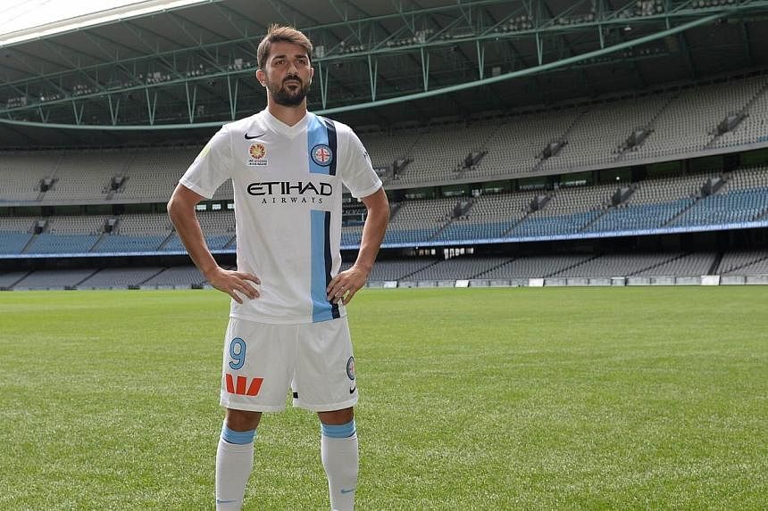 Spain's striker David Villa in his new Melbourne City Football Club (MCFC) kit during the A-League 2014/15 season launch at Etihad Stadium in Melbourne&nbsp;on Oct 7, 2014.&nbsp;Former Spain striker David Villa will definitely make his A-League footb