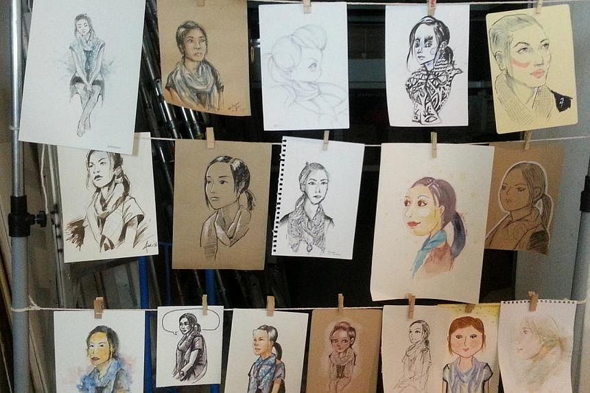 Mass drawing: Members of Band of Doodlers (left) draw on white walls while those of Urban Sketchers (above) have regular sketch walks. A sample of portrait drawings (right) by members of the Organisation of Illustrators Council.