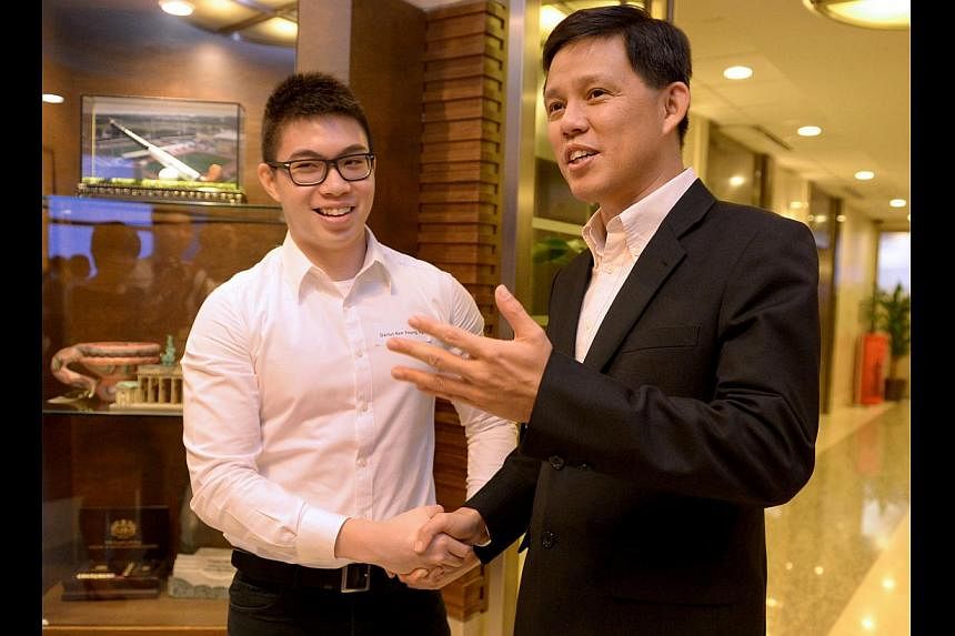 Minister for Social and Family Development Chan Chun Sing with Mr Darius Ng, a recipient of the Early Childhood Development Agency Polytechnic Training Award, at yesterday's ceremony to recognise recipients of ECDA scholarships and awards.
