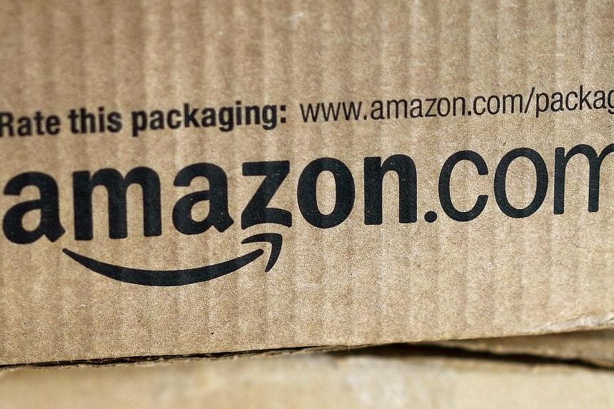 A just-delivered Amazon box is seen on a counter in Golden, Colorado on Aug 27, 2014.&nbsp;Online retail colossus Amazon.com plans to open its first brick-and-mortar store in New York ahead of the year-end holiday season, The Wall Street Journal repo