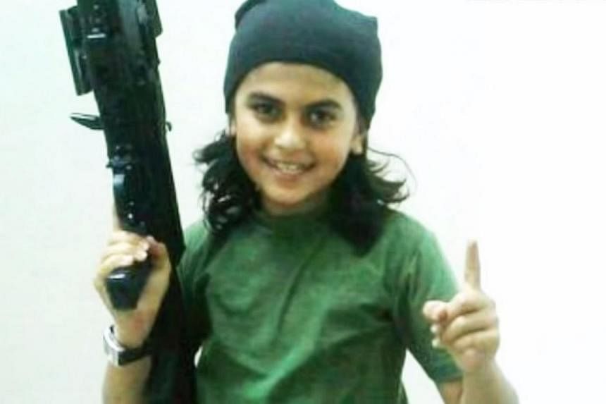 A screenshot from a YouTube video of Mohammad al-Absi Abu Obeida, dubbed the Cub of Baghdadi.&nbsp;A child from the United Arab Emirates (UAE) fighting with Islamic State in Syria was killed along with his father in a US-led coalition air strike, sup