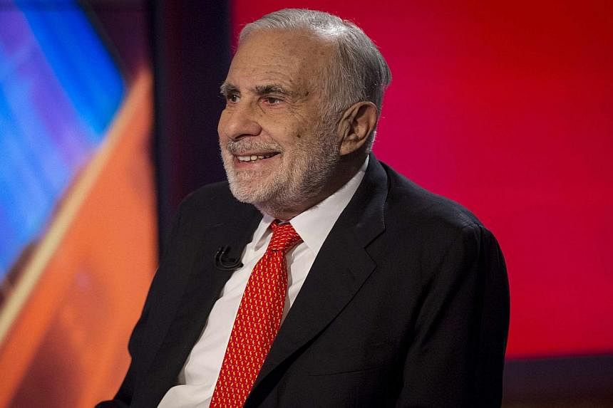 Billionaire activist investor Carl Icahn (above) said on Thursday that Apple's shares could double in value and urged the company's board to buy back more shares using its US$133 billion (S$169 billion) cash pile. -- PHOTO: REUTERS