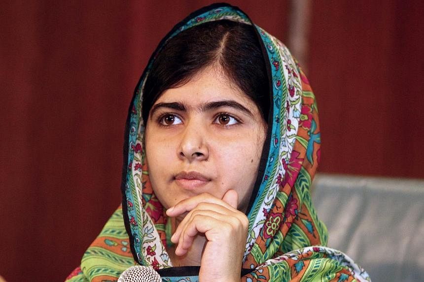 Pakistan's Prime Minister Nawaz Sharif has congratulated teenage education campaigner Malala Yousafzai on winning the Nobel Peace Prize, calling her the "pride" of his country. -- PHOTO: AFP